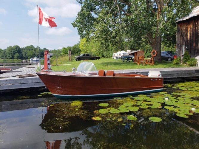 Gren Ell boat on the water tied to a dock