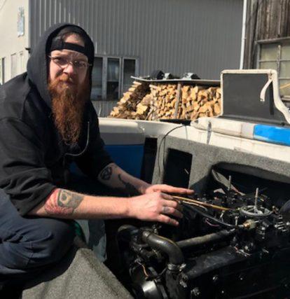 sirens boatworks employee smiling